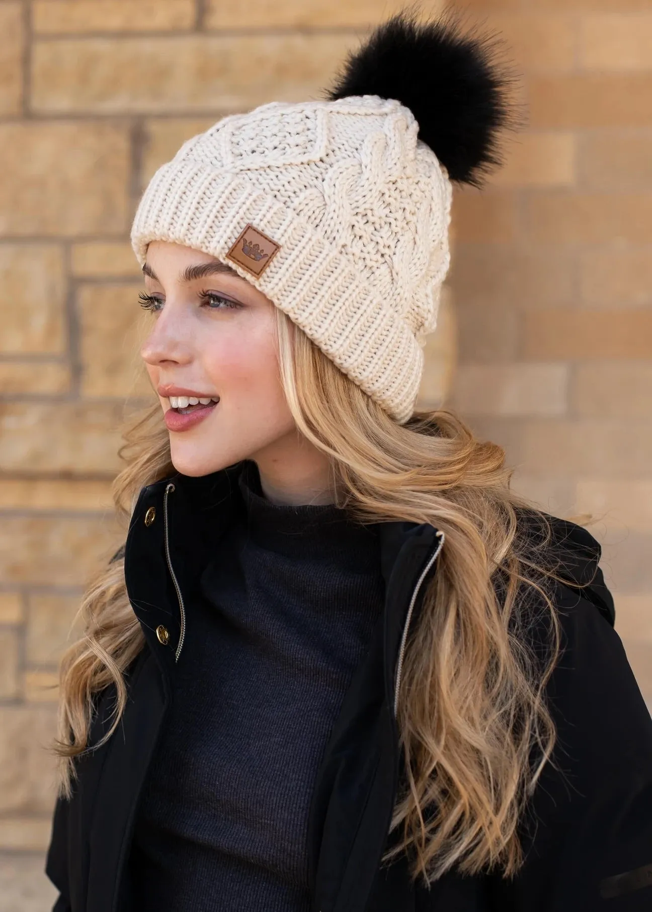 Ivory Cable Knit Hat with Black Pom